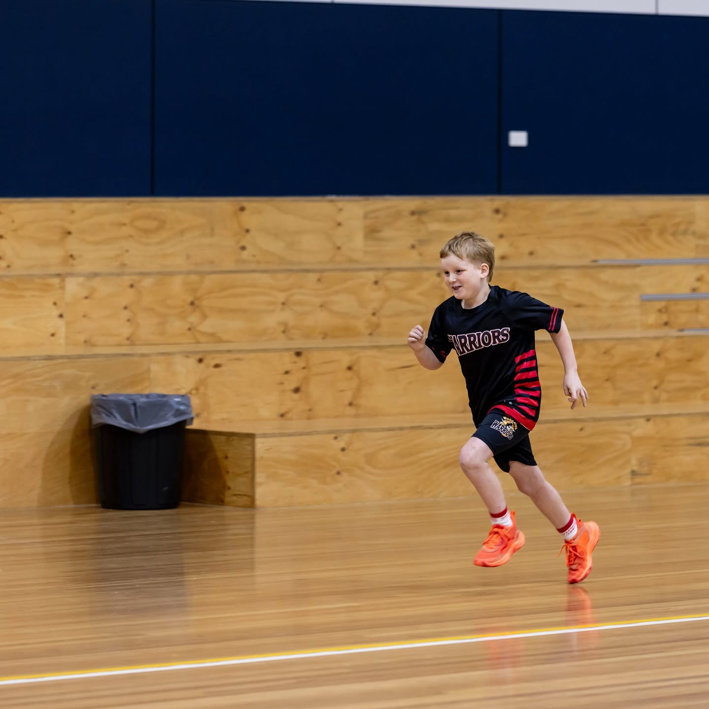 U12-U14 players conditioning on court